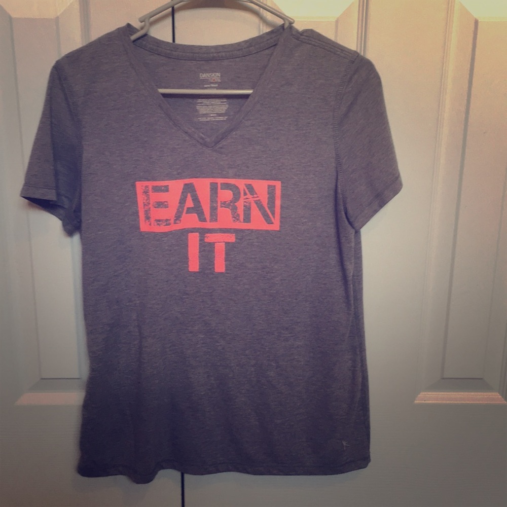 Heather grey t-shirt with v-neck and pink design.